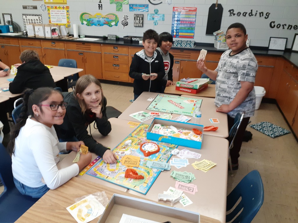 Mrs. Shear (4th Grade), Mrs. Richards (4th Grade), and Mrs. Lorenc (5th Grade) classes playing Monopoly! 
